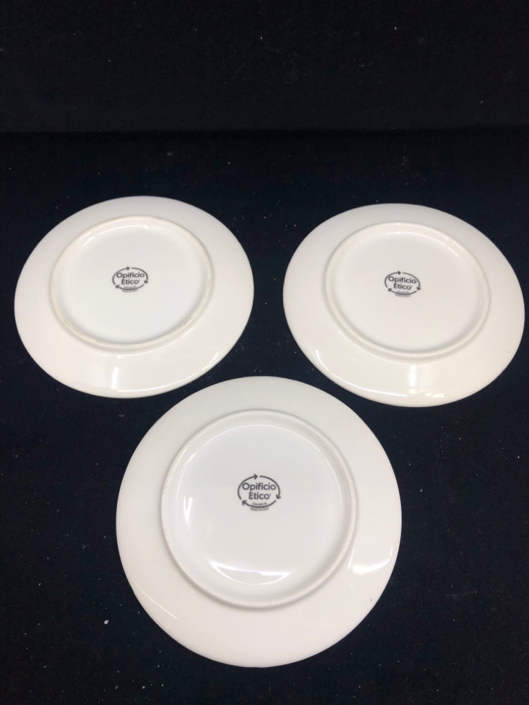 3 WHITE CERAMIC CHEESE PLATES.