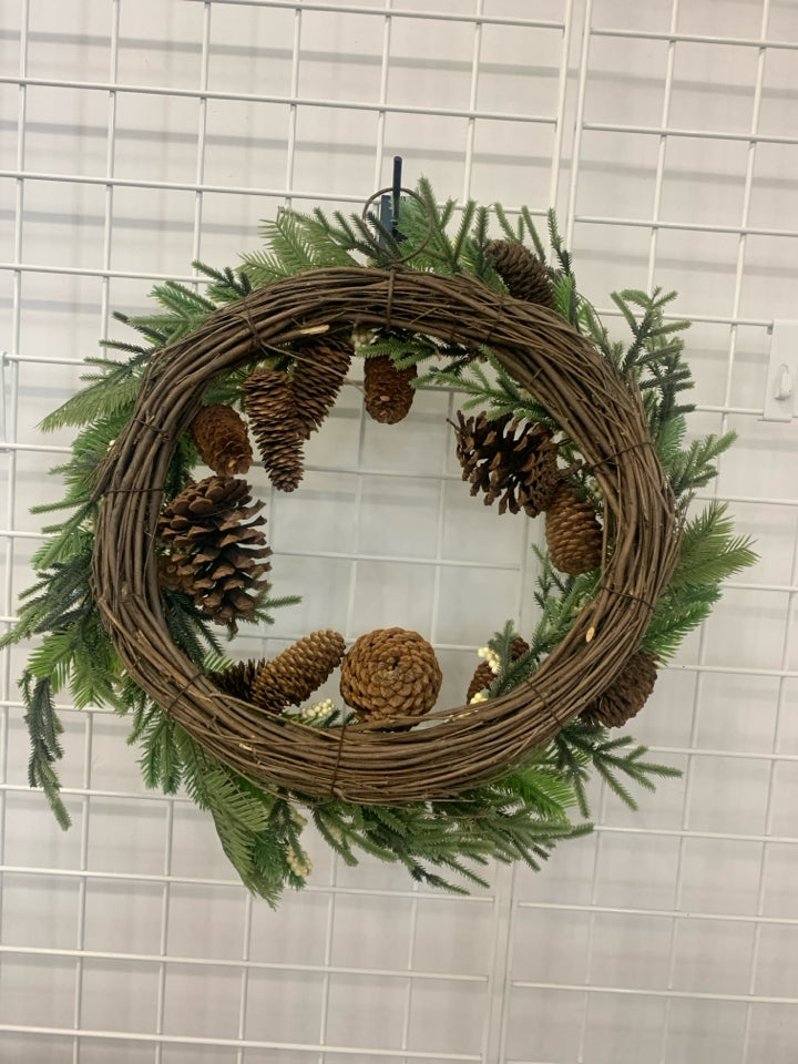 FAUX WREATH W PINECONES AND WHITE PIP BERRIES.