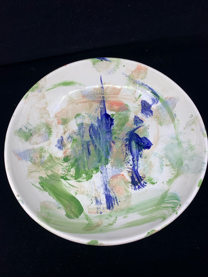 WHITE POTTERY BOWL W/ COLORFUL ABSTRACT DESIGN.