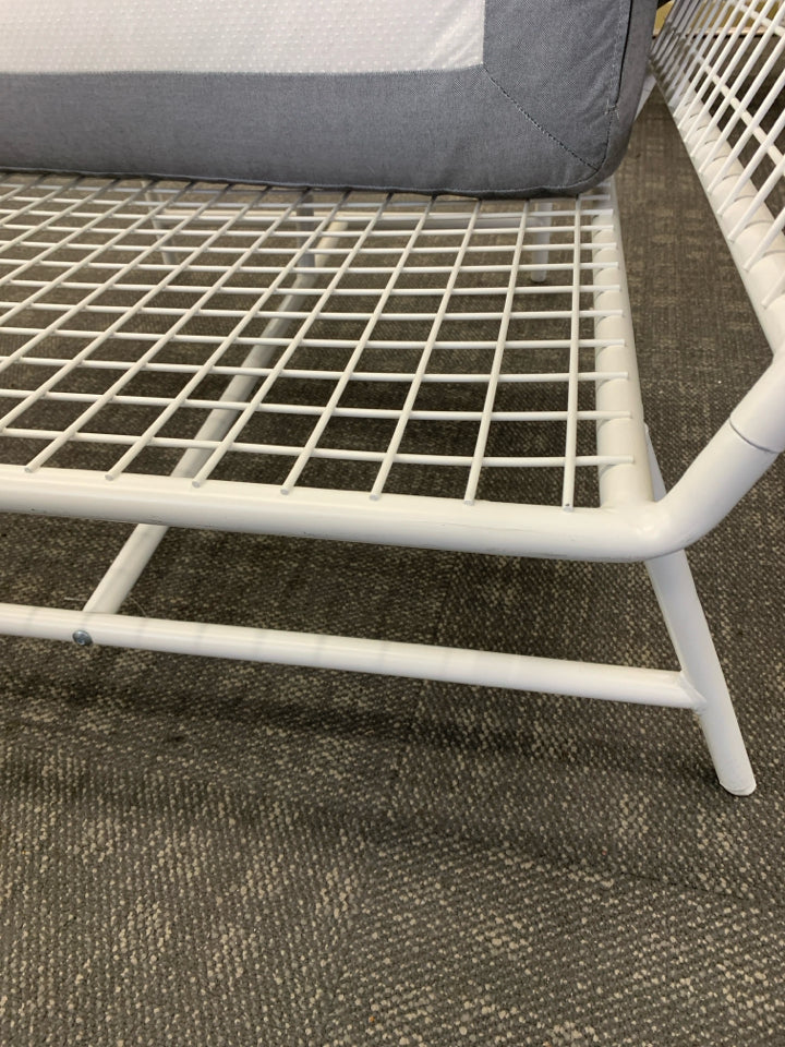 CORNER CHAIR W/WHITE WHITE METAL FRAME & 3 GRAY CUSHIONS.