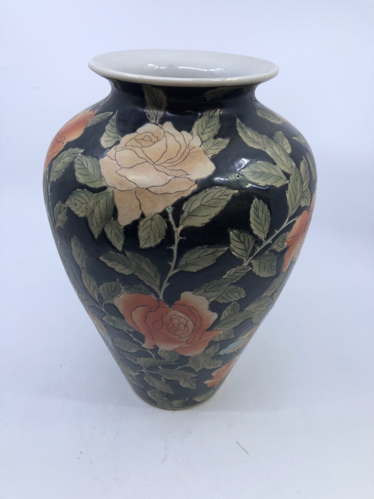 BLACK CERAMIC VASE W/ORANGE FLOWERS.