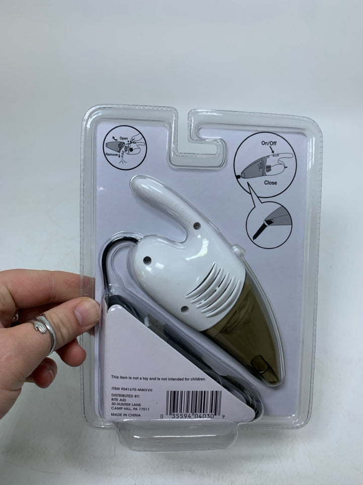 NIP WORLDS SMALLEST VACUUM.