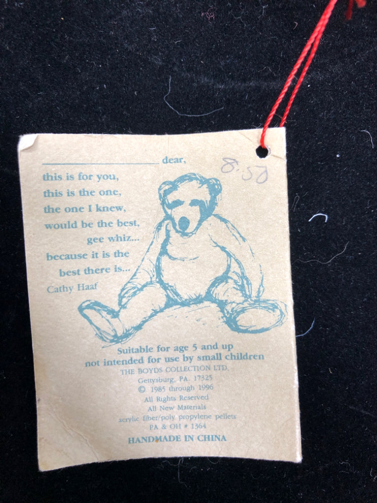 WHITE STUFFED BOYDS BEAR W/LEATHER COLLAR.