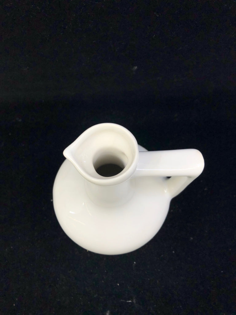 WHITE JUG W/HANDLE- NO LID.