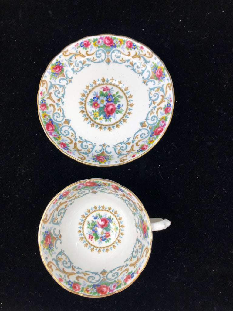 VTG BLUE AND PINK FLORAL TEACUP AND SAUCER.