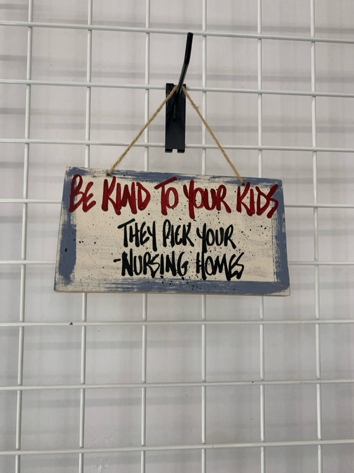 BE KIND TO YOUR KIDS WOODEN WALL HANGING.