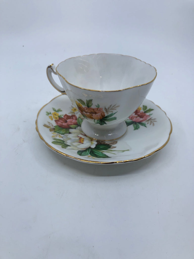 VTG BONE CHINA PINK AND WHITE FLORAL TEACUP AND SAUCER.