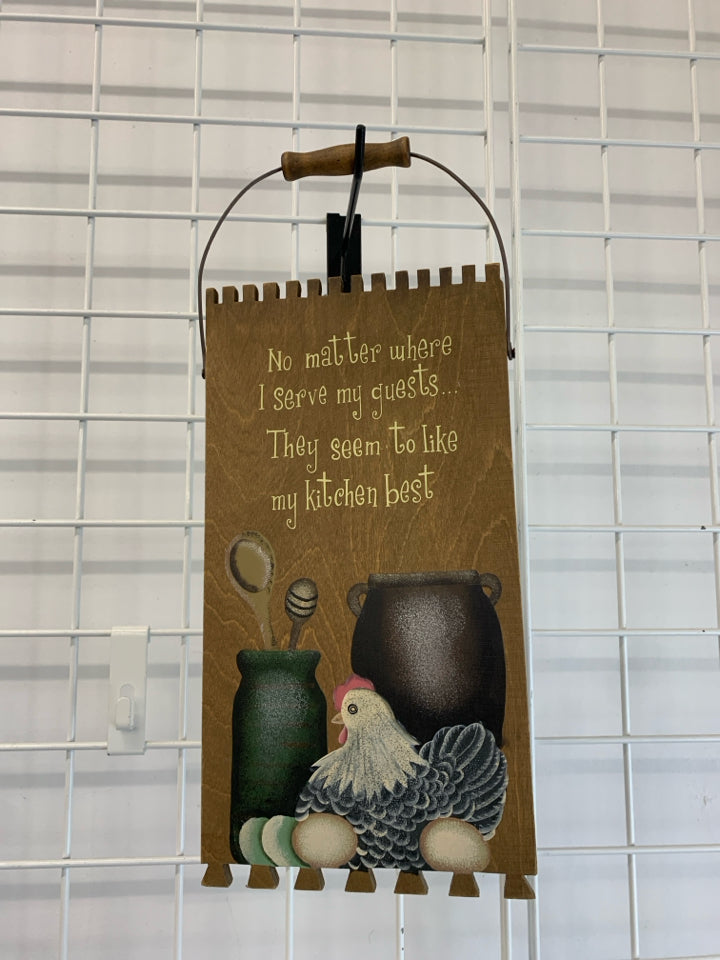 NO MATTER WHERE I SERVE MY GUESTS WOODEN KITCHEN WALL-HANGING.