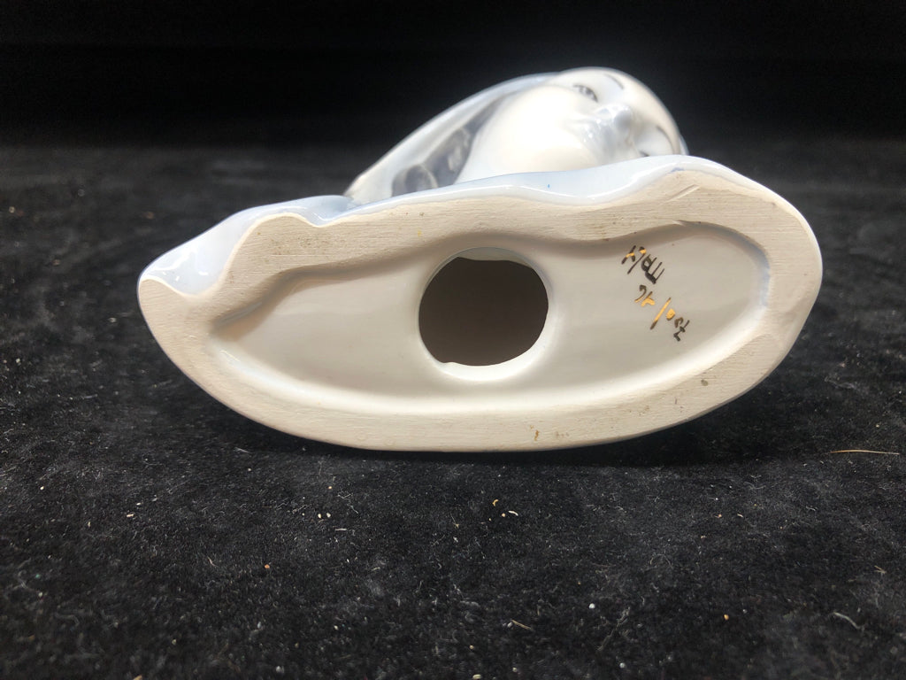 CERAMIC BLUE TINTED WOMANS HEAD.