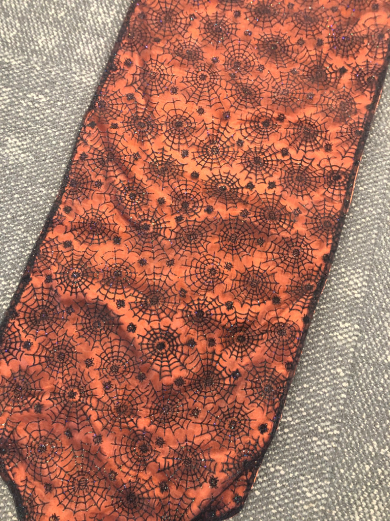 BLACK AND ORANGE SPIDER WEB TABLE RUNNER.