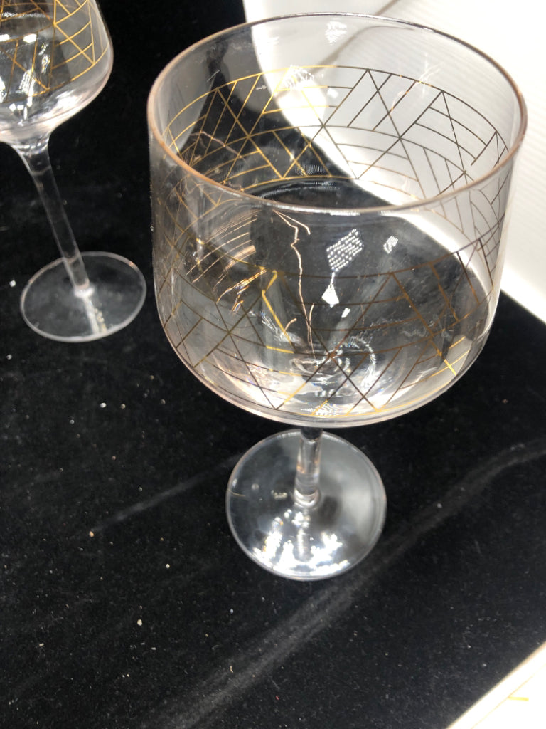 4 GEOMETRIC GOLD WINE GLASSES.