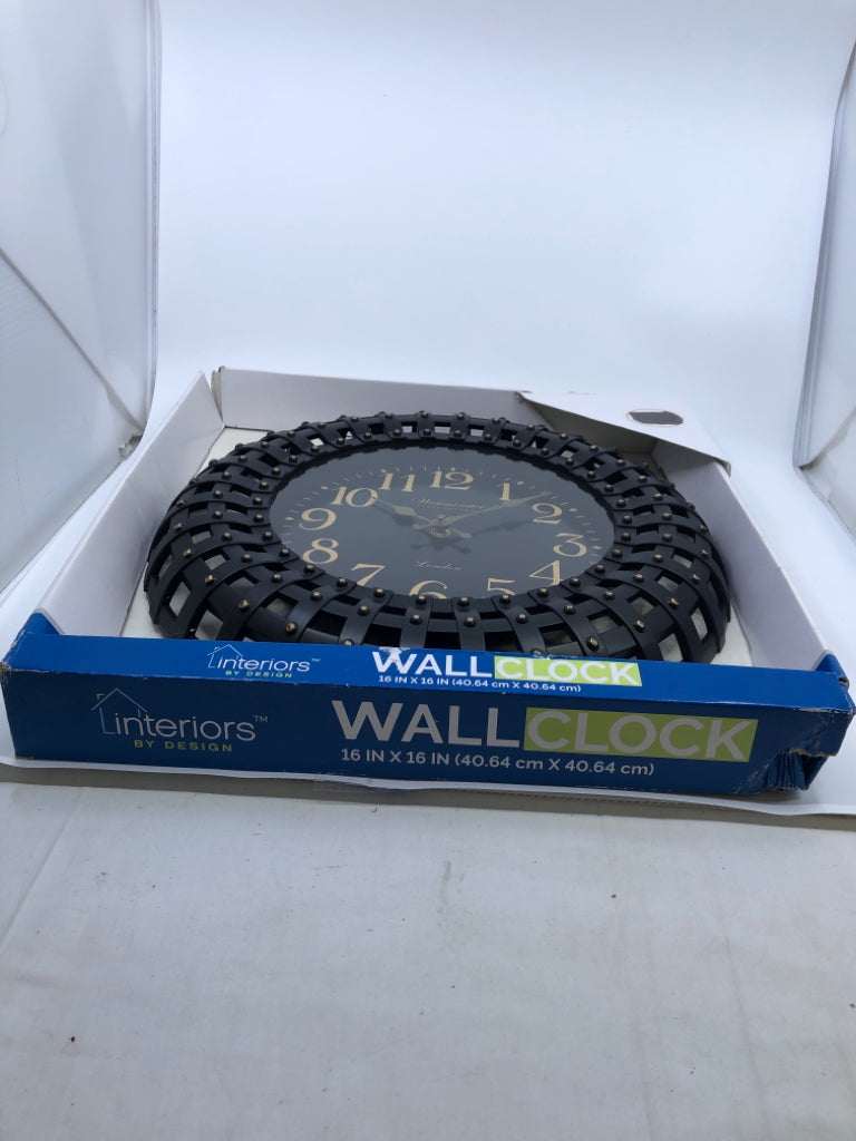 NIB BLACK WALL CLOCK.