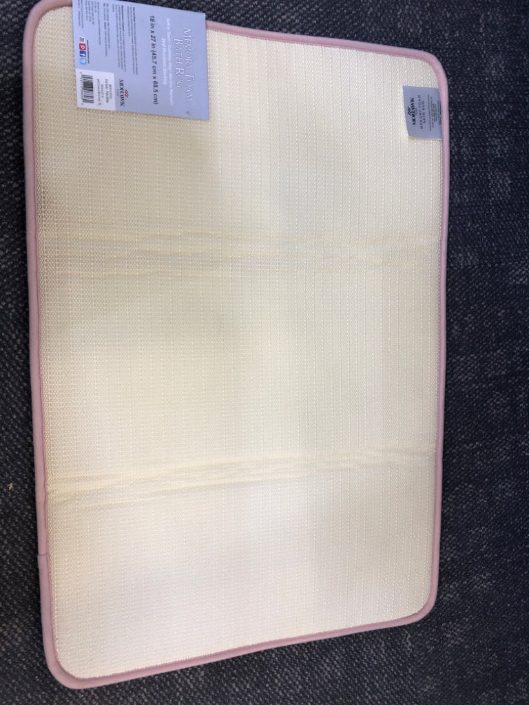 NIP PINK MEMORY FOAM BATH RUG.