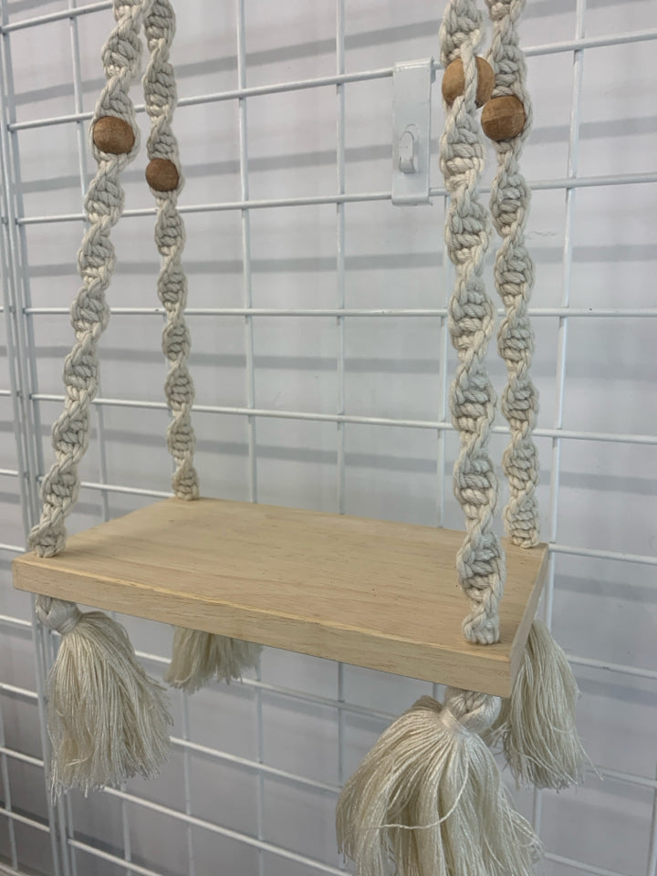 HANGING MACRAME AND WOOD SHELF.