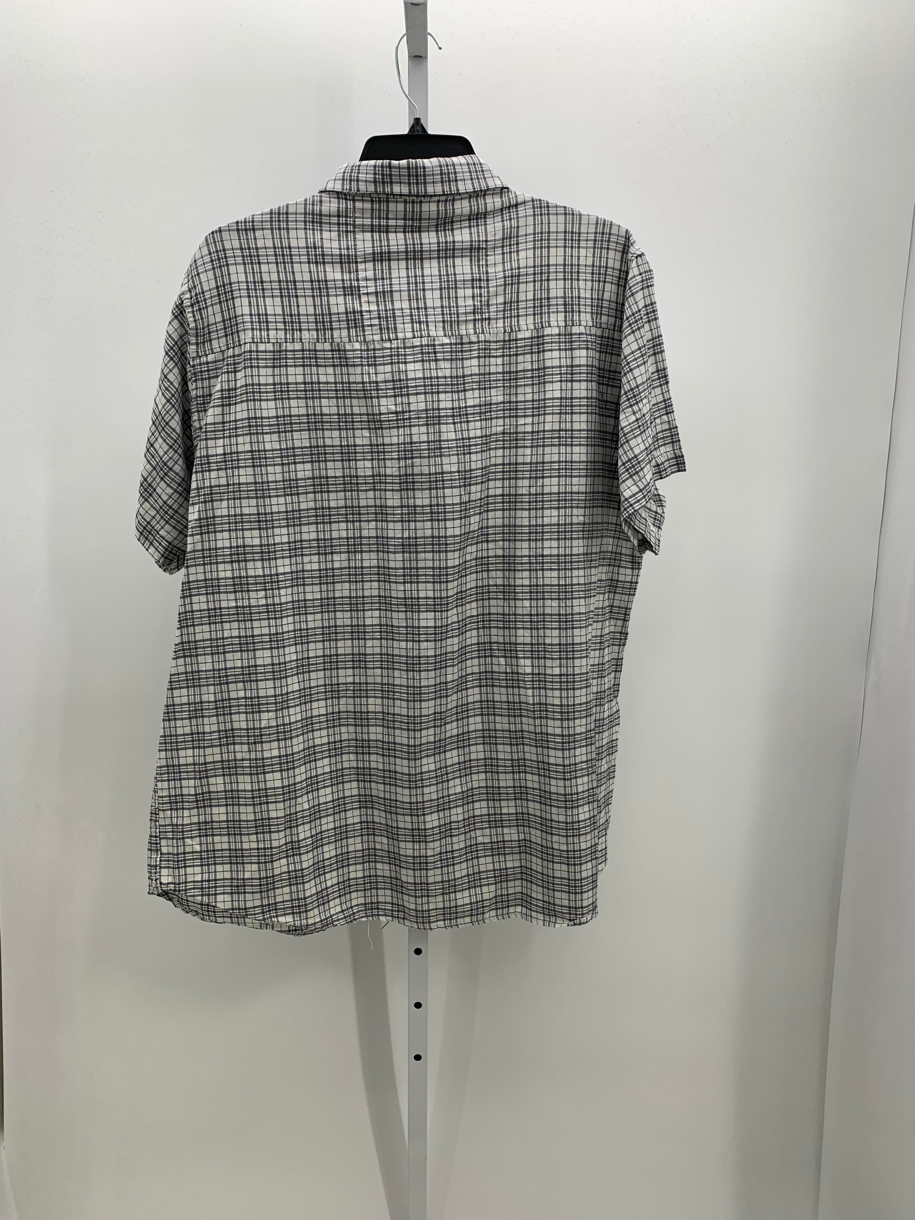 TALL PLAID BTN DOWN.