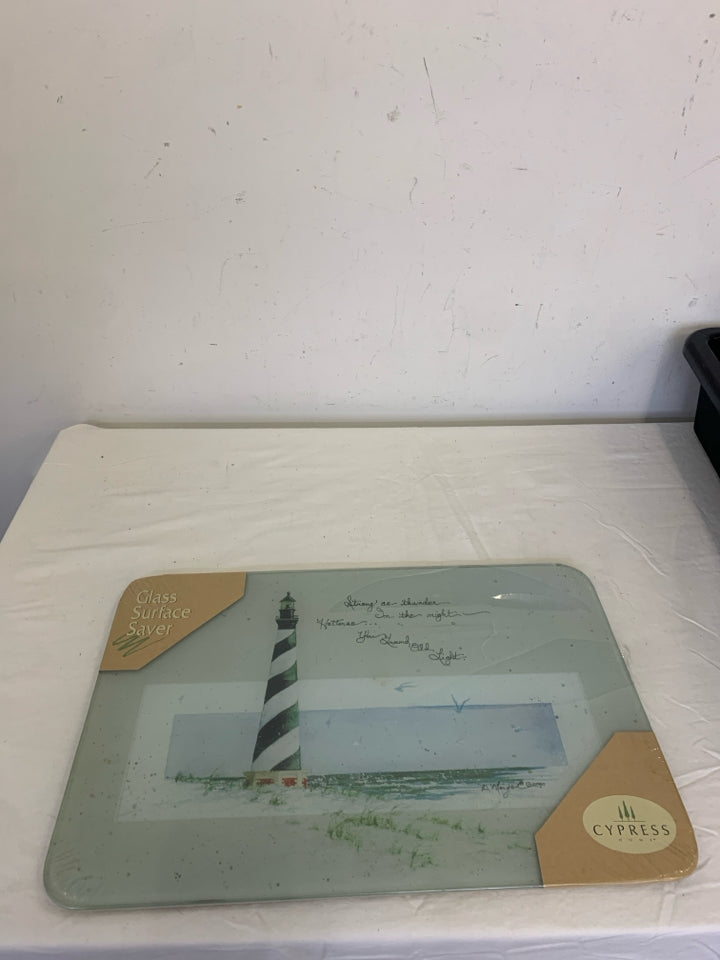 NIP LIGHTHOUSE GLASS CUTTING BOARD.