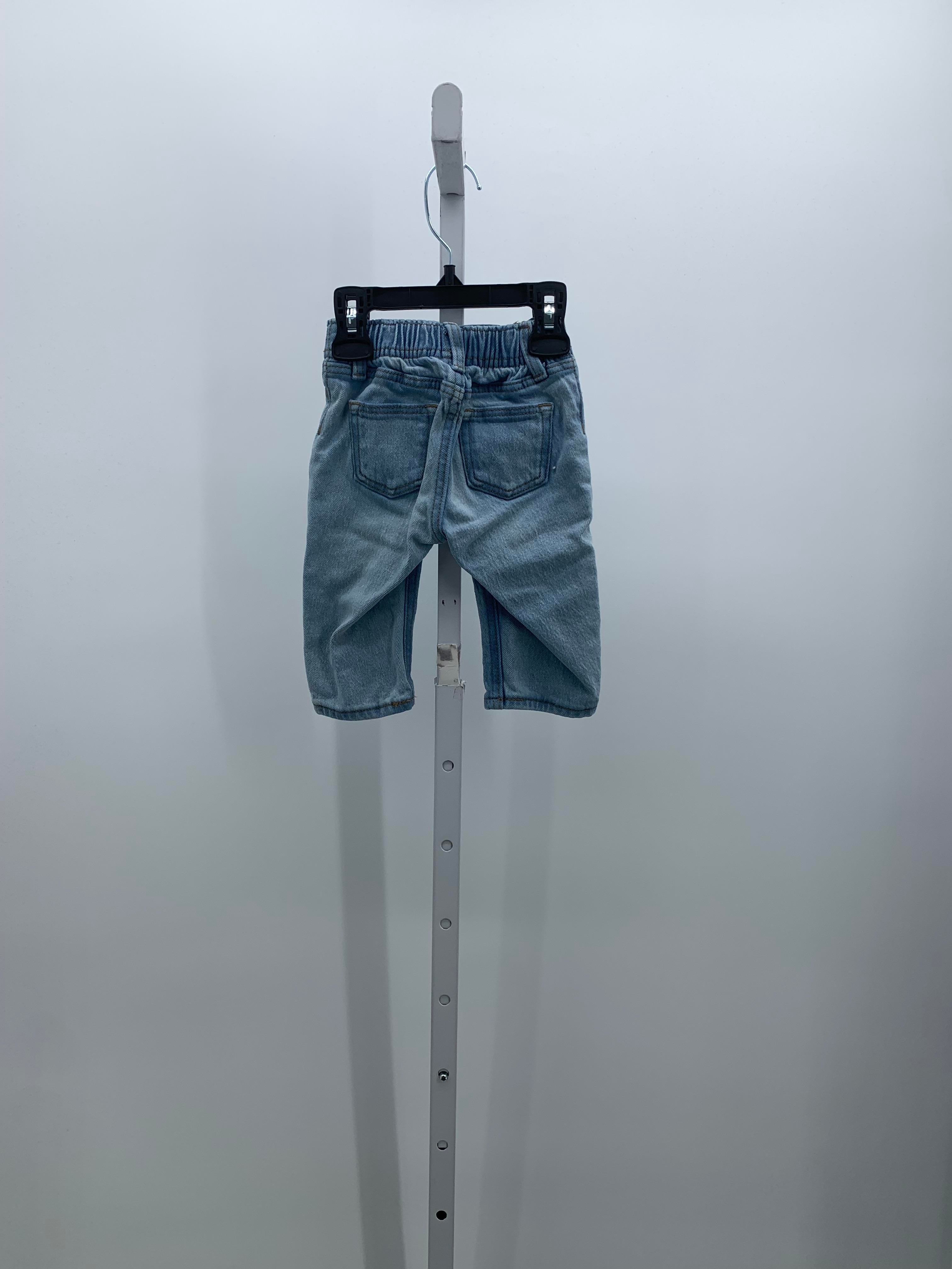 DISTRESSED BACK ELASTIC JEANS