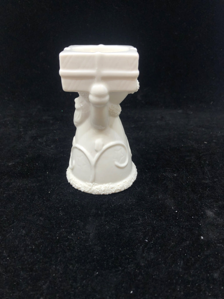 WHITE SANTA HOLDING PRESENT YANKEE CANDLE TEA LIGHT.