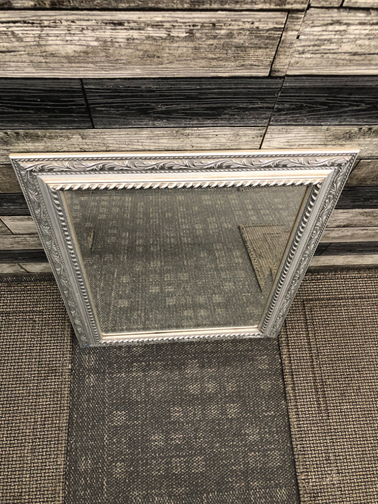 SILVER EMBOSSED MIRROR.