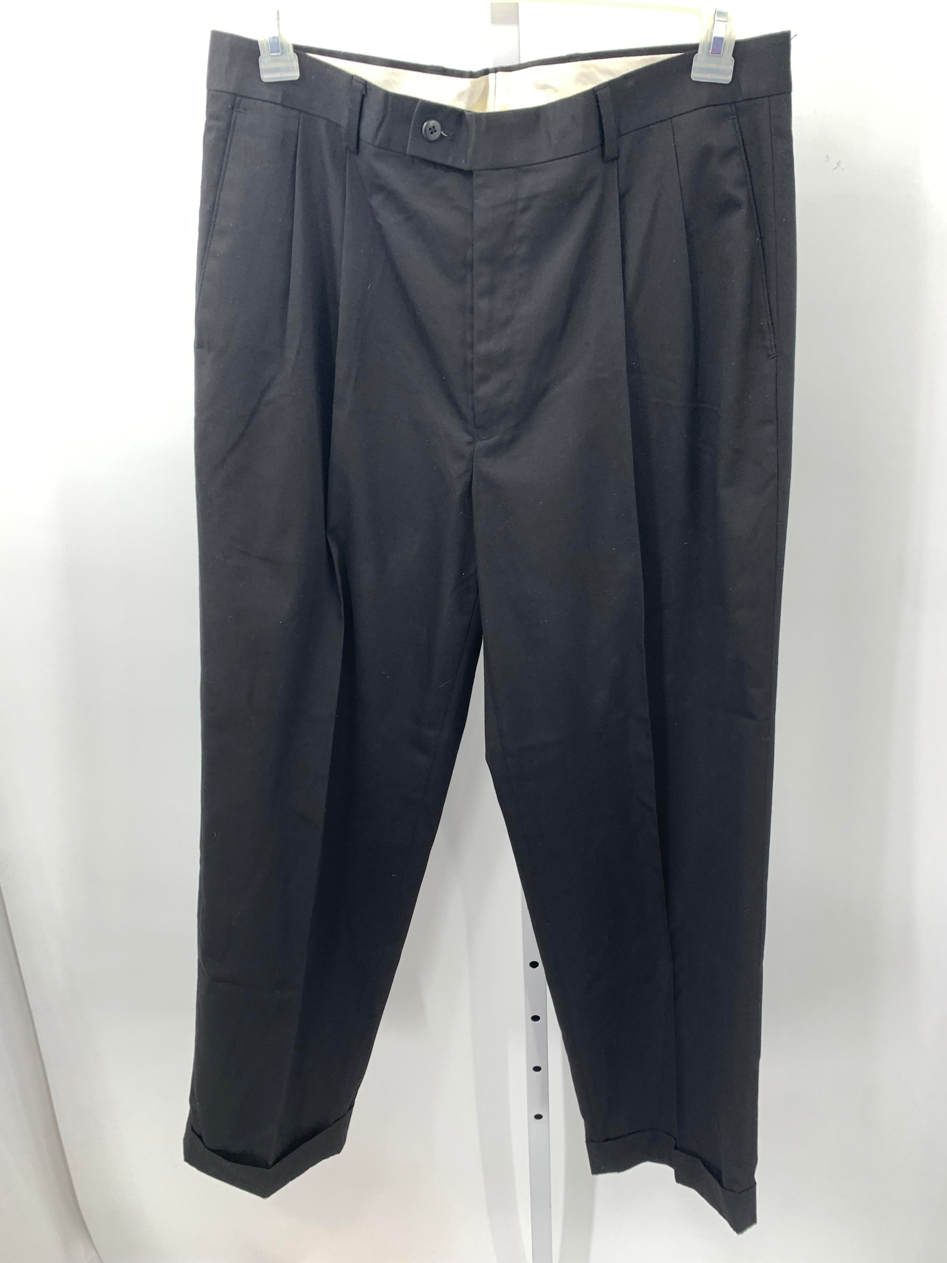 PLEATED FRONT PANTS.