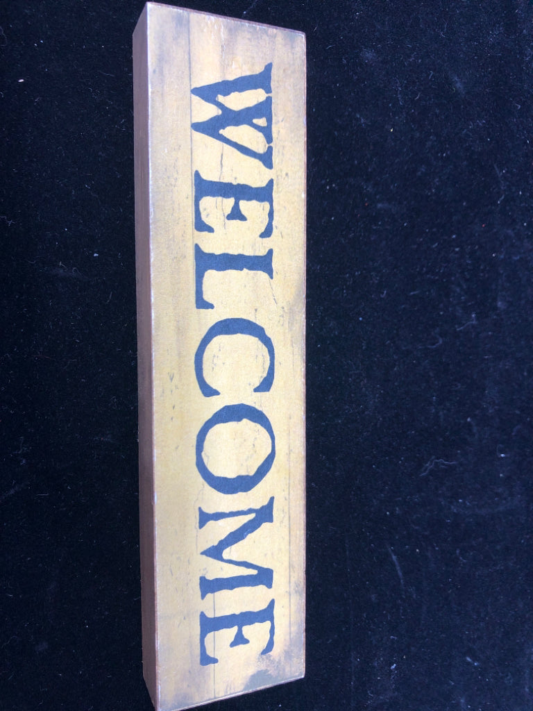 PRIMITIVE "WELCOME" BLOCK SIGN.