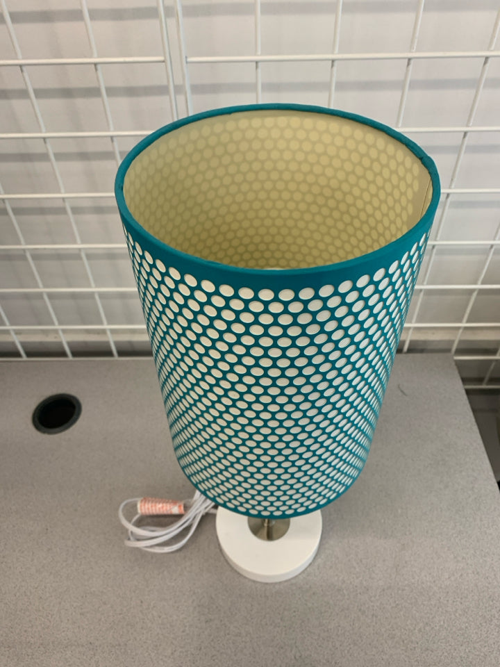 LAMP W/ BLUE WHITE DOTTED SHADE.
