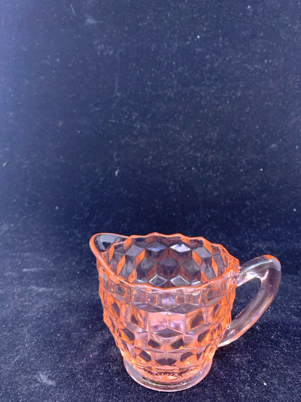 SMALL TEXTURED PINK GLASS CREAMER.