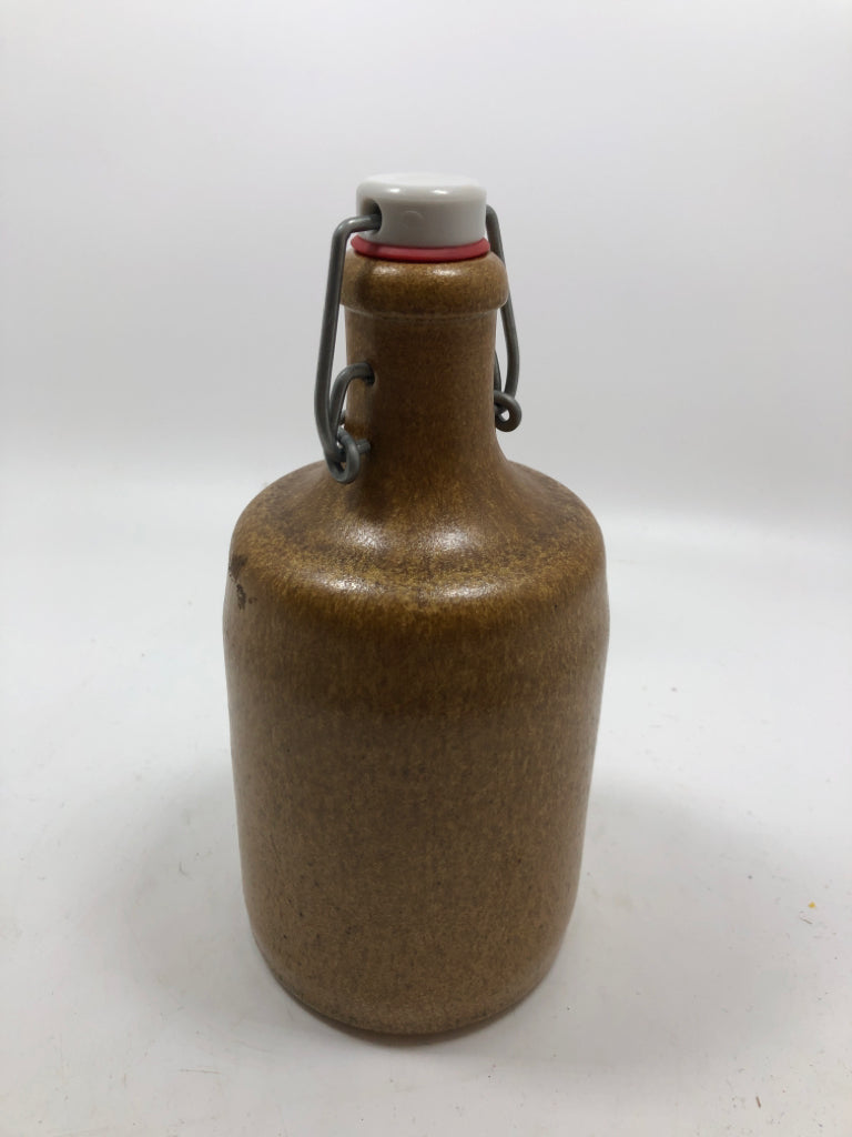 BROWN STONEWARE JUG W/CAP.