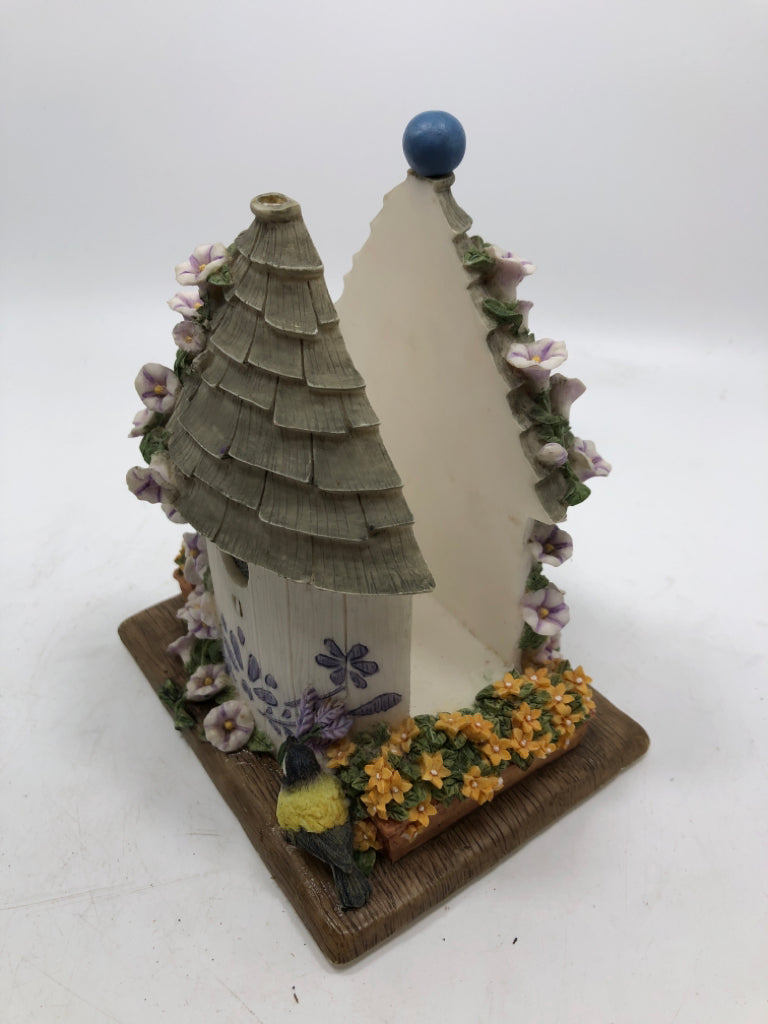 BIRD HOUSE AND FLOWERS RESIN NAPKIN HOLDER.