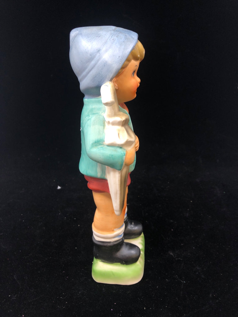 VTG BOY WITH UMBRELLA FIGURINE.