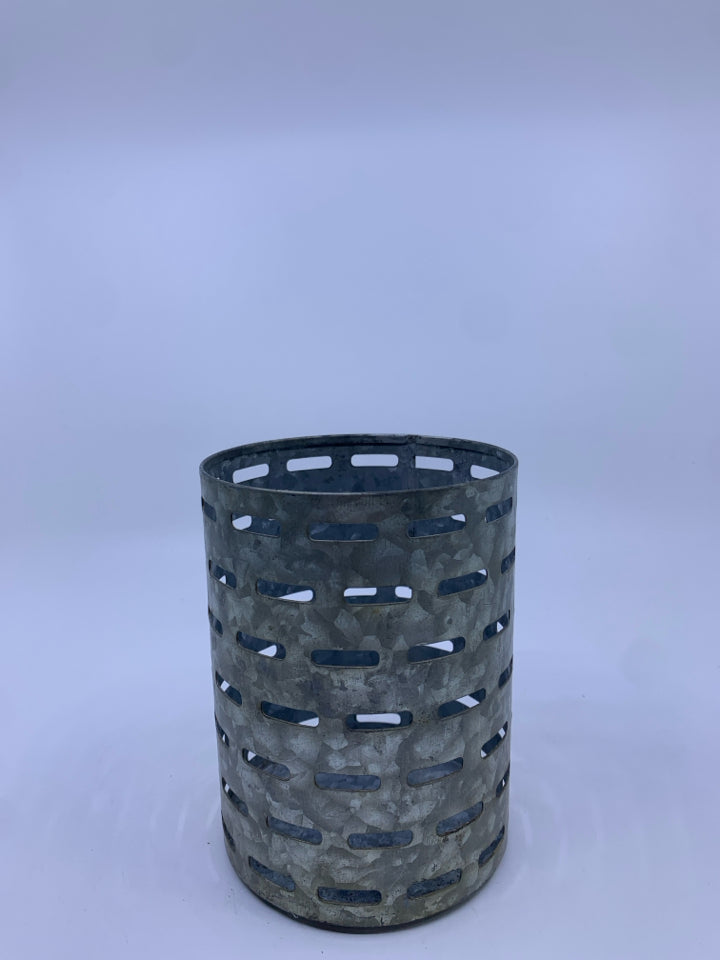 GALVANIZED METAL CANDLE HOLDER.