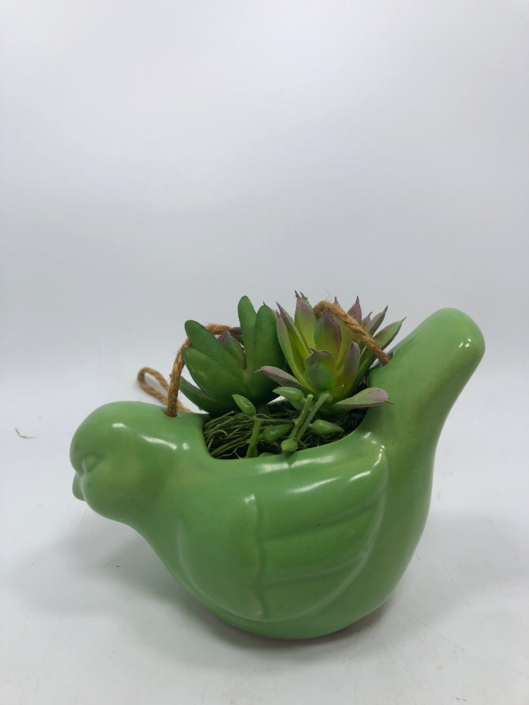 HANGING GREEN BIRD PLANTER W/FAUX SUCCULENT.
