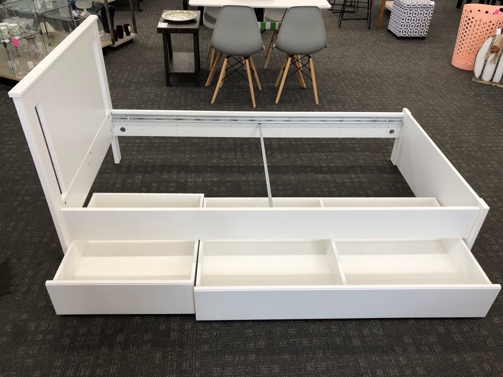 WHITE WOOD TWIN BED W/2 ROLLING DRAWERS.