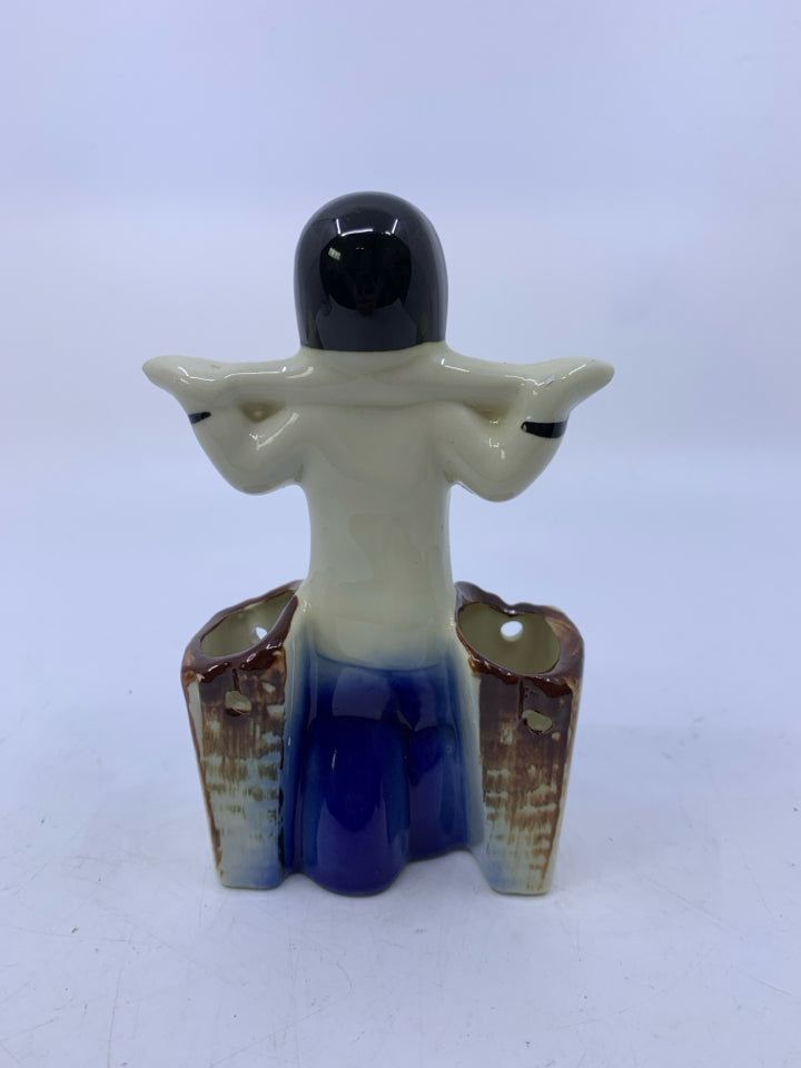 MAN W/ BLACK HAIR CARRYING SOMETHING ON SHOULD BLUE JEAN DOUBLE VASE/TOOTHPICK H