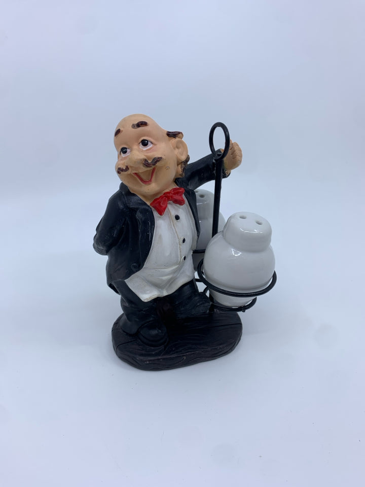 RESIN BUTLER SALT AND PEPPER SHAKER SET.