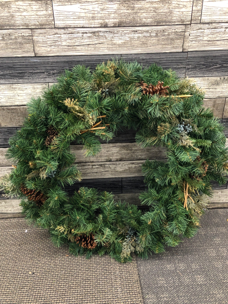 LARGE WREATH W/PINECONES AND TWIGS.