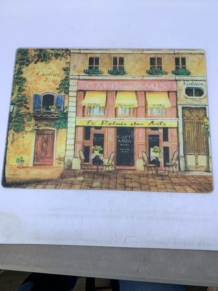 GLASS SIDE STREET W/ CAFE SCENE.