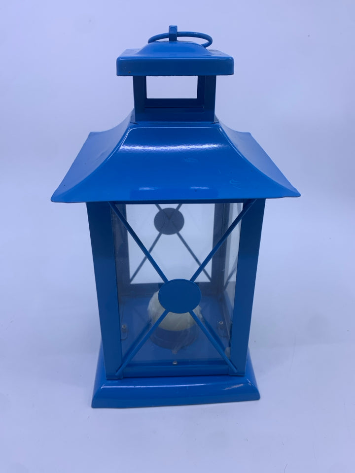 BLUE METAL TEA LIGHT LANTERN.