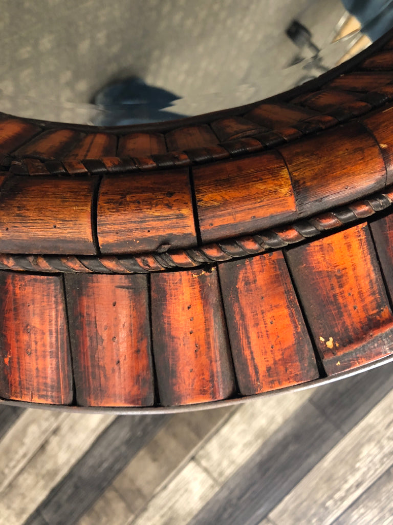 ROUND BAMBOO FRAMED WALL MIRROR.