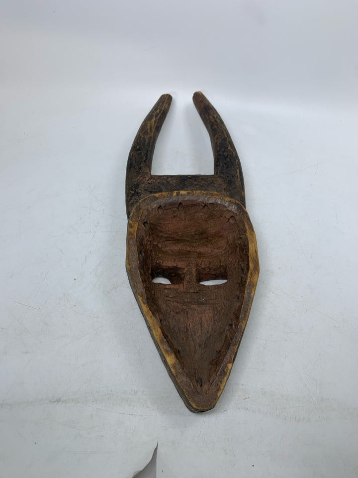 WOOD CARVED WINKING MASK W/ POINTED EARS.