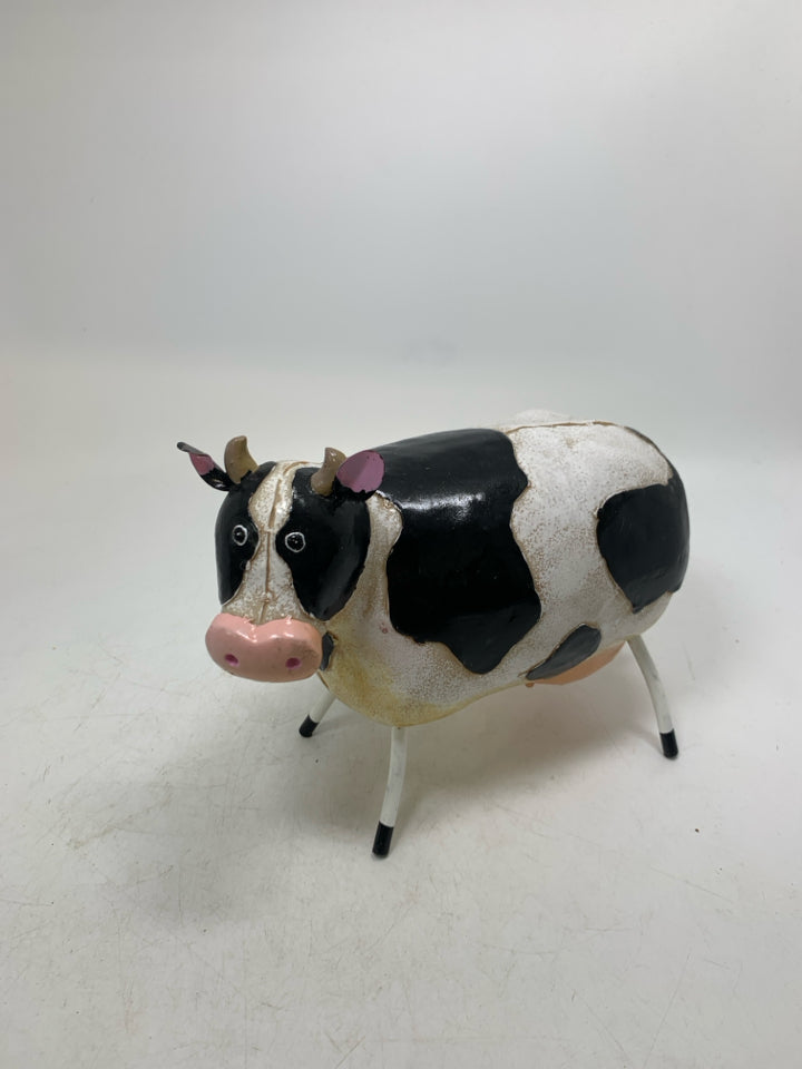 RESIN COW W/ METAL ACCENTS.
