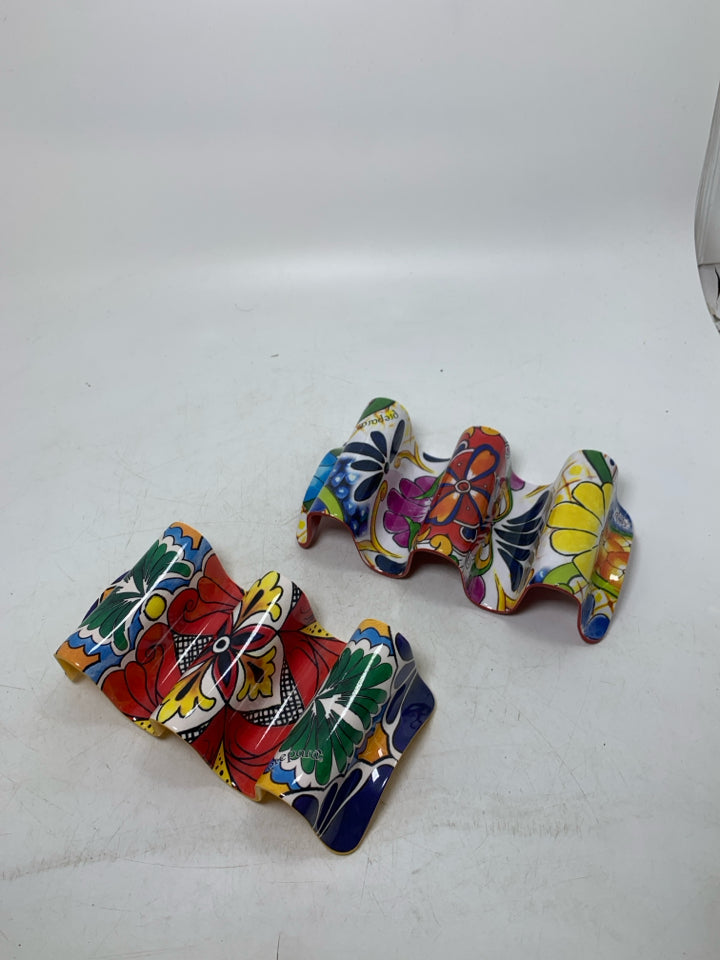 2 MELAMINE COLORFUL TACO HOLDERS.
