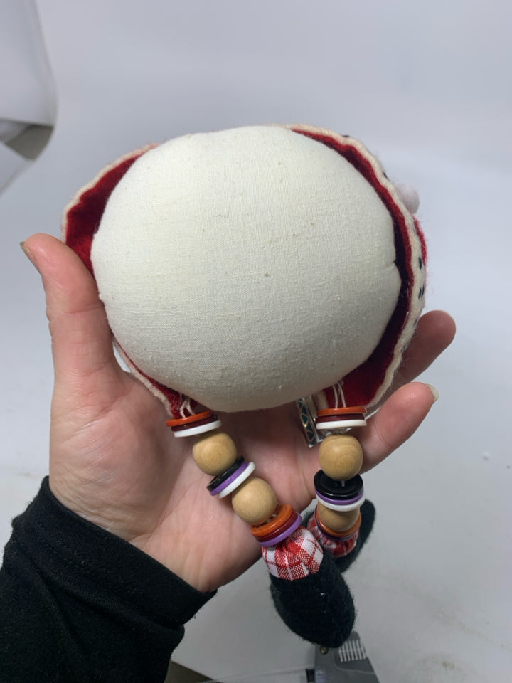SMALL ROUND PLUSH SANTA W/ BUTTON/BEADS LEGS.