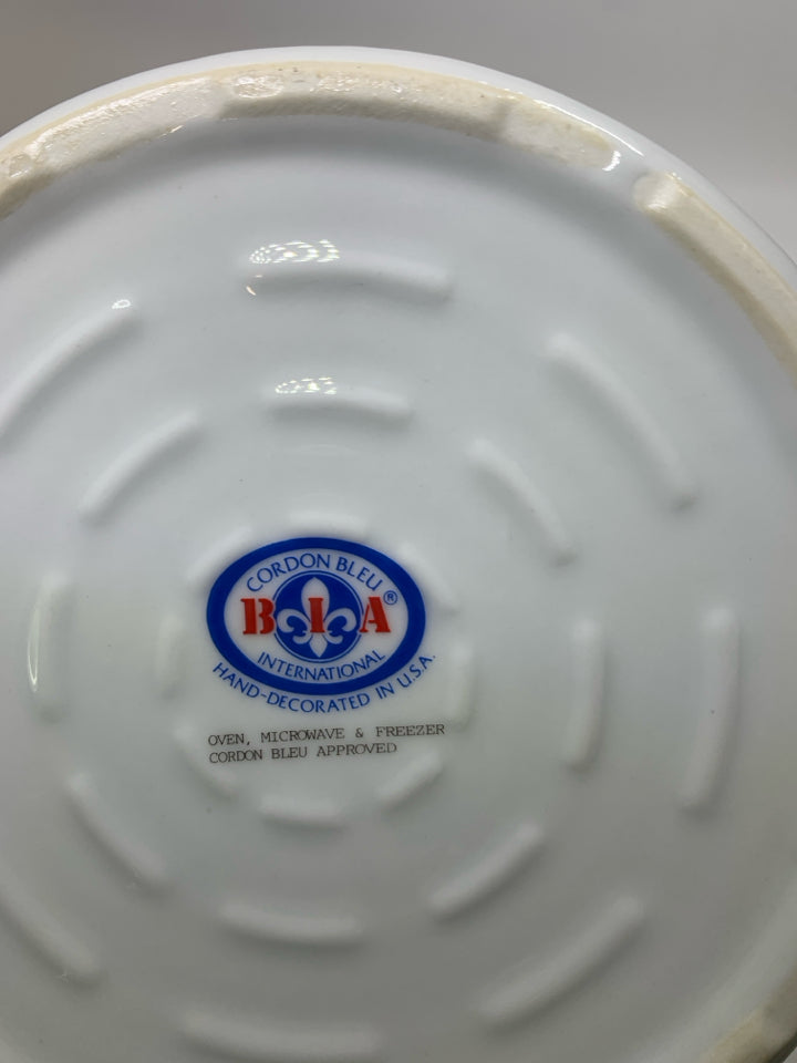 VTG COROLINE PATTERN FLOWERS/BUTTERFLIES RIBBED CIRCLE BAKING DISH.
