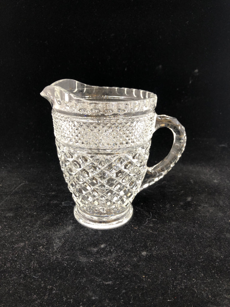 SMALL CLEAR CUT GLASS PITCHER.