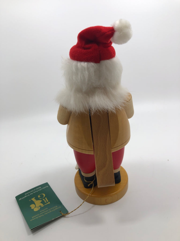 RG GERMAN- SANTA NUT CRACKER W/ BAG OF COOKIES.