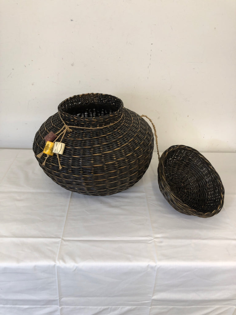 DARK WICKER WOVEN BASKET W CHARMS AND LID.