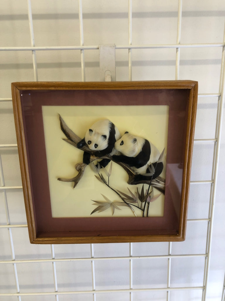 SHADOW BOX W/ FEATHERED PANDAS IN BRANCH.