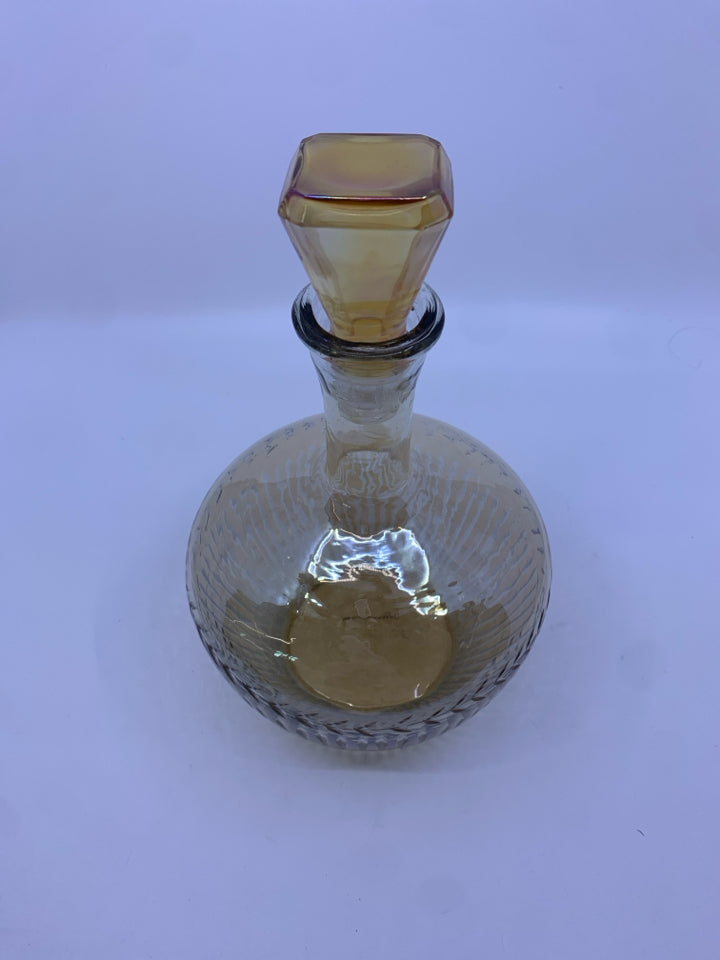 AMBER GLASS ETCHED DECANTER.