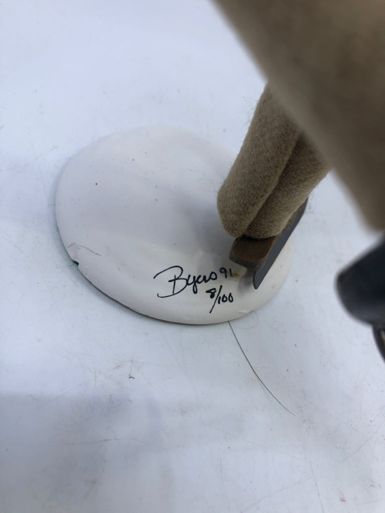 MAN IN GREEN COAT W/ SKATES "THE SKATERS" 1991 BRYERS CHOICE.